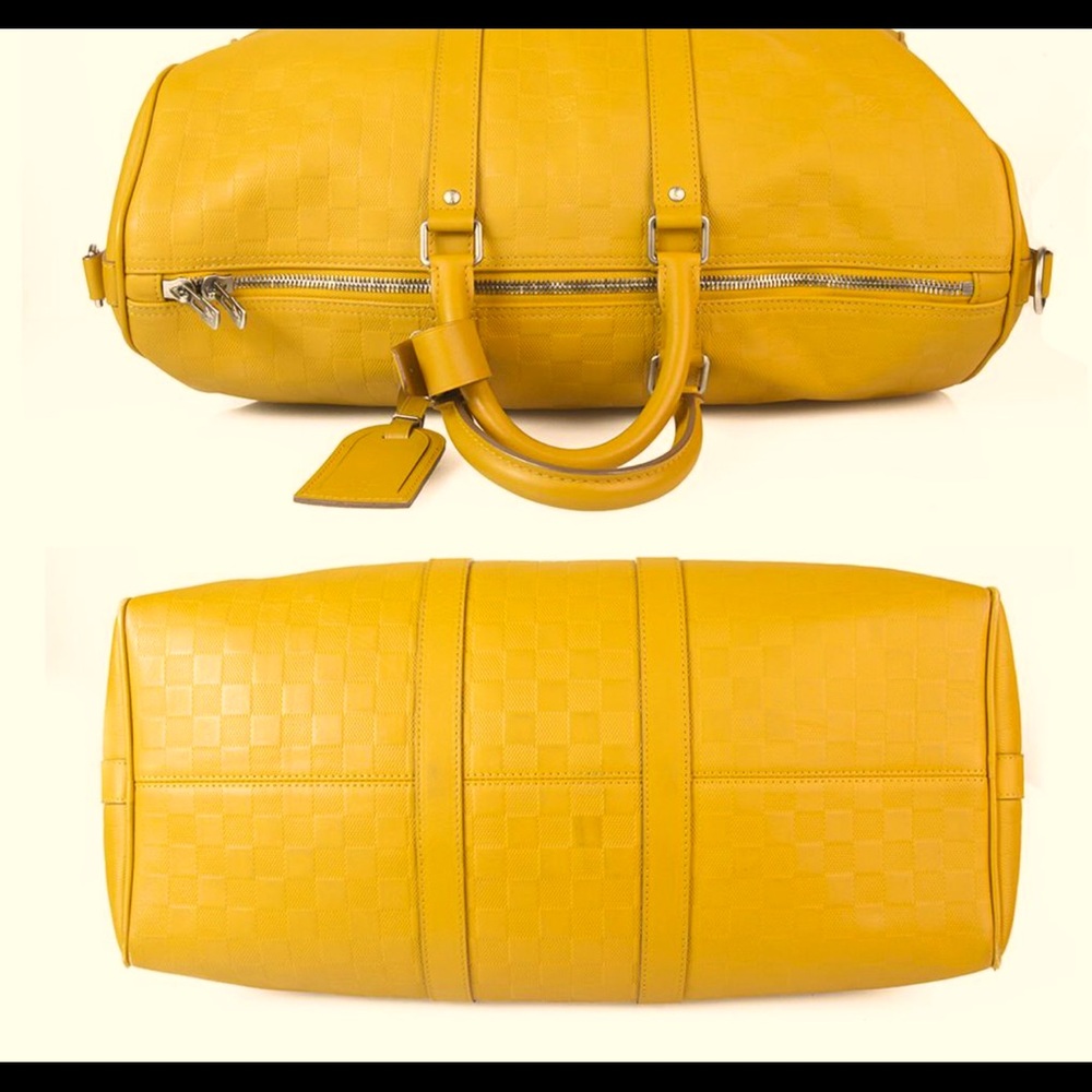 Louis Vuitton mustard duffel bag